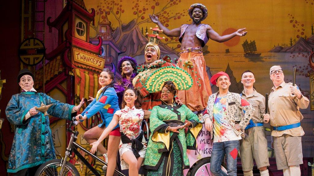 The cast of Aladdin pose during a photocall for Hackney Empire's 20th Anniversary pantomime