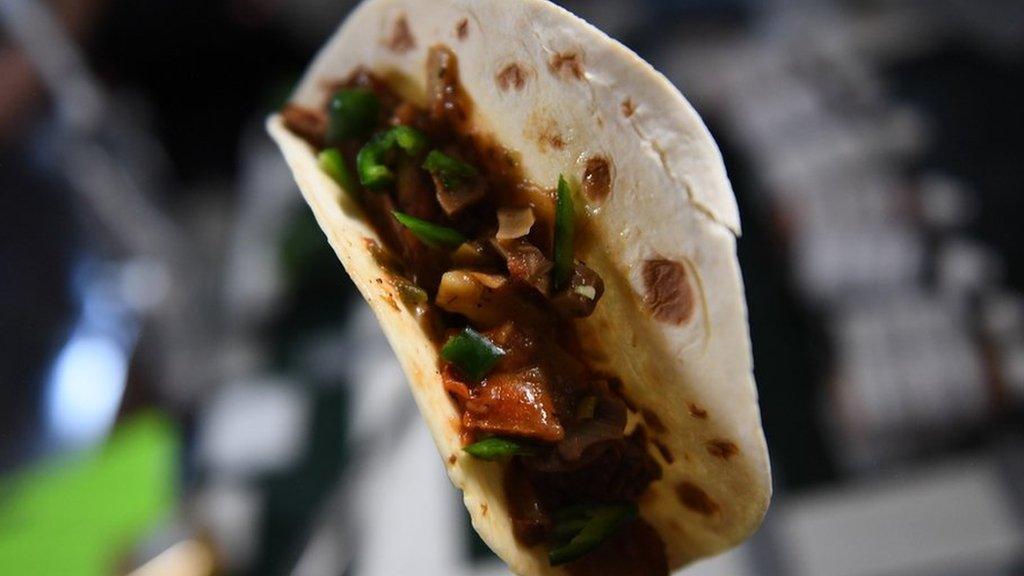 A taco floating in zero gravity onbaord the ISS