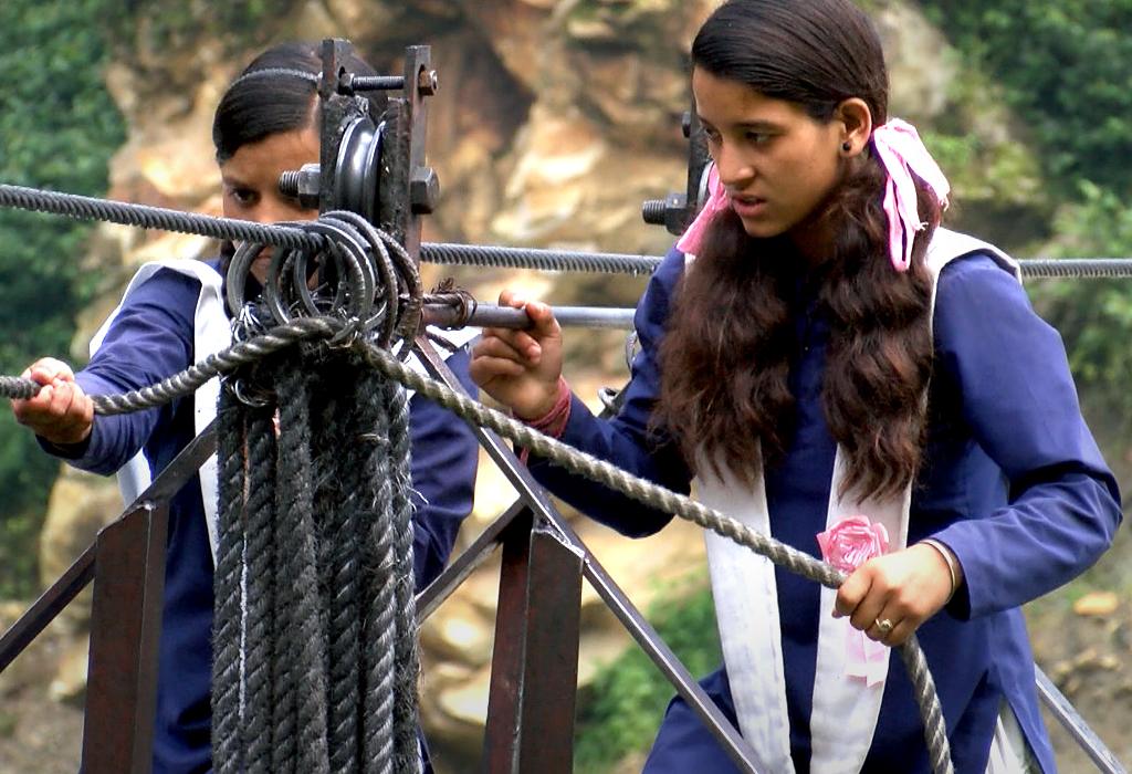 Pulling the rope on the river crossing