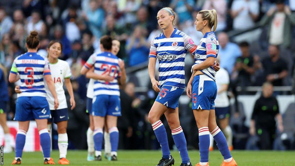 Reading players react to defeat by Tottenham