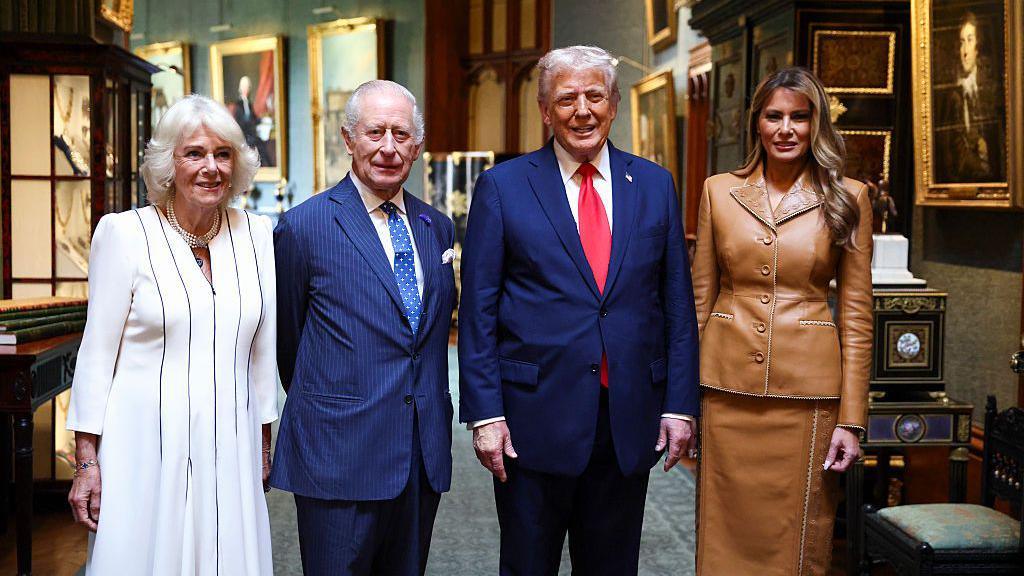 U.S. President Donald Trump and first lady Melania Trump pose with King Charles and Queen Camilla as they bid their farewells at Windsor Castle during a state visit on September 18 2025