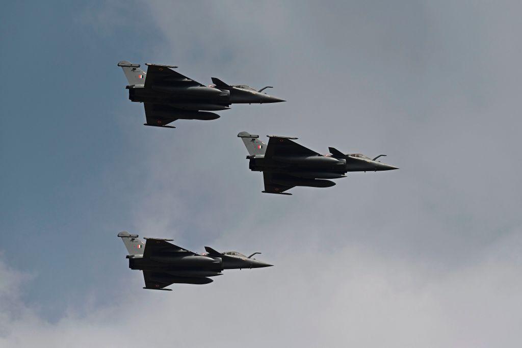 Indian Air Force's Rafale fighter jets fly past during the first day of the Aero India 2021 Airshow at the Yelahanka Air Force Station in Bengaluru on February 3, 2021.