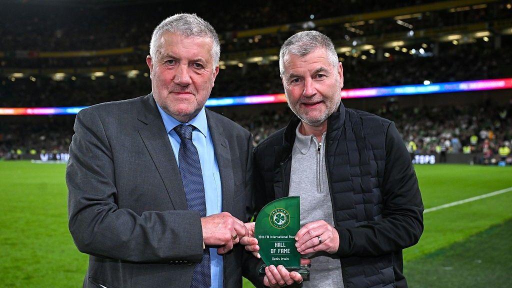 Former Leeds and Manchester United defender Denis Irwin (right) was inducted into the FAI Hall of Fame in September 2025