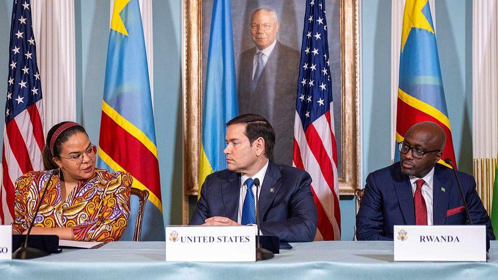 Two months ago, on 25 April, US Secretary of State Marco Rubio (C), Rwandan Foreign Minister Olivier Nduhungirehe (R) and Democratic Republic of the Congo Foreign Minister Therese Kayikwamba Wagner sign of a Declaration of Principles between the two countries in the Treaty Room of the State Department in Washington DC.
