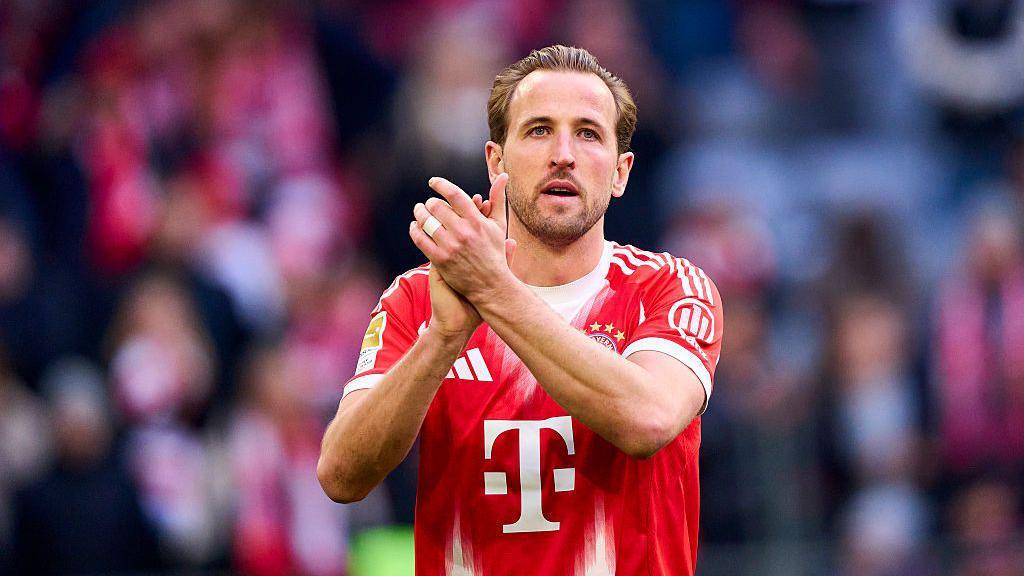 Harry Kane applauds after Bayern Munich's win against Freiburg