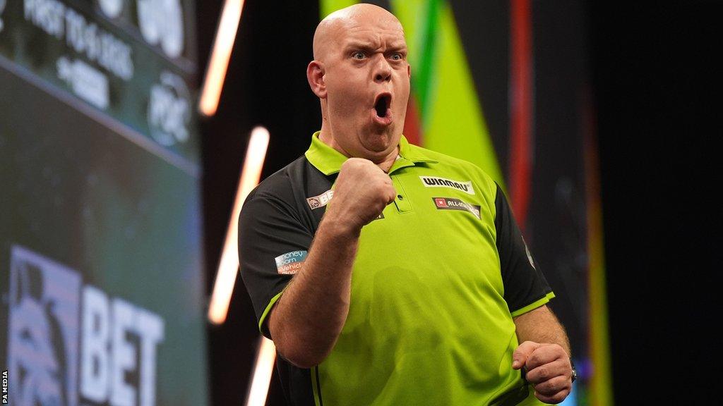 Michael van Gerwen celebrates winning a game at Premier League Darts night 11 in Birmingham