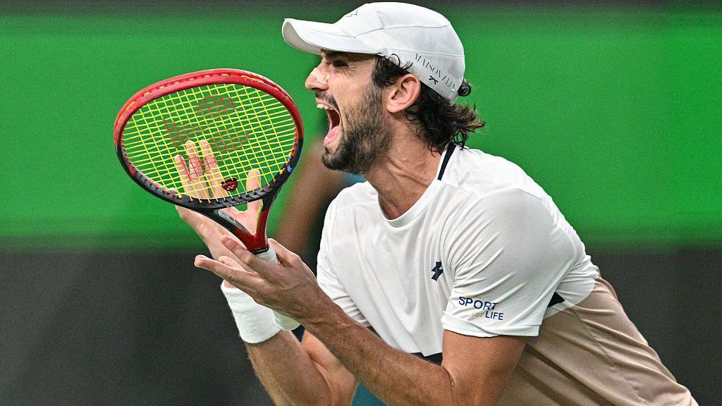 Valentin Vacherot screaming with delight after securing victory