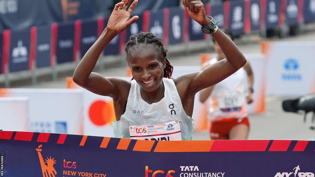 Hellen Obiri celebrates after winning the New York Marathon