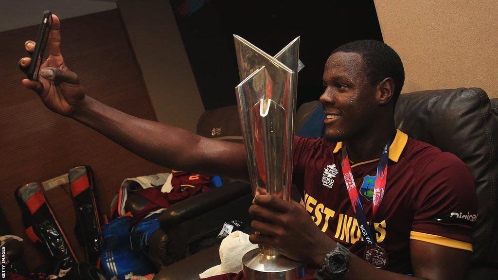 Carlos Brathwaite takes a selfie with the T20 World Cup