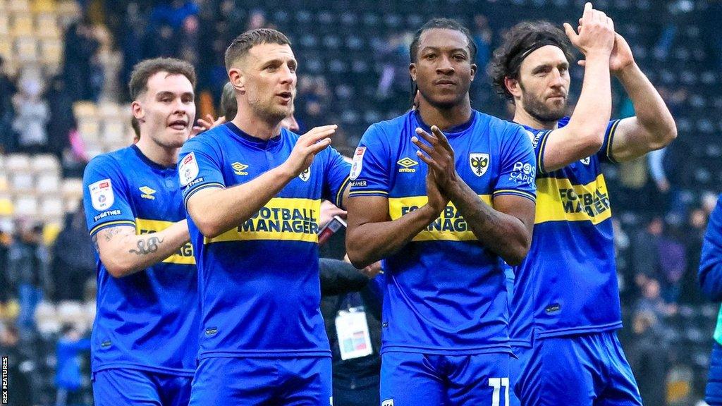 AFC Wimbledon celebrate victory over Notts County