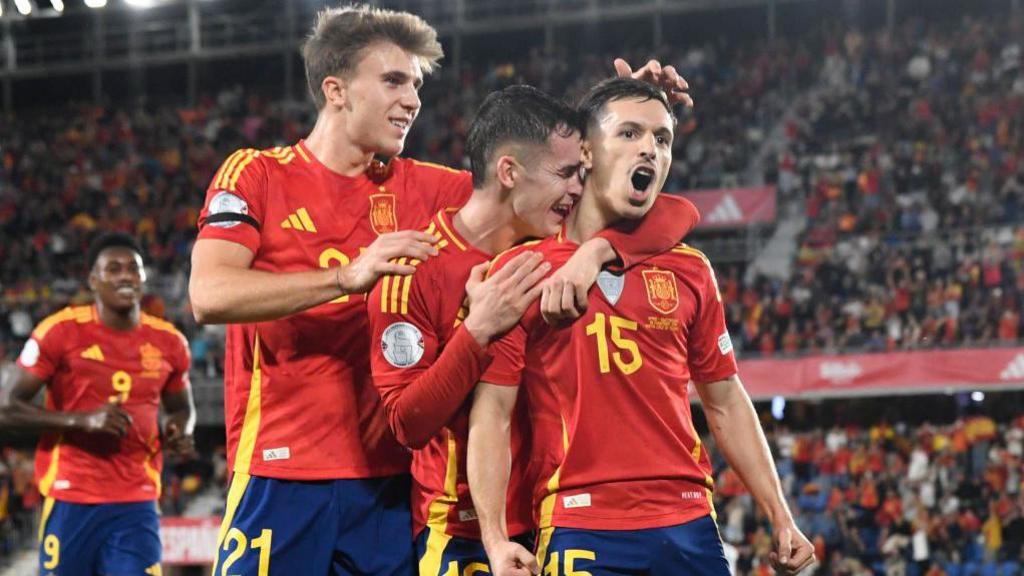 Spain celebrate their winner