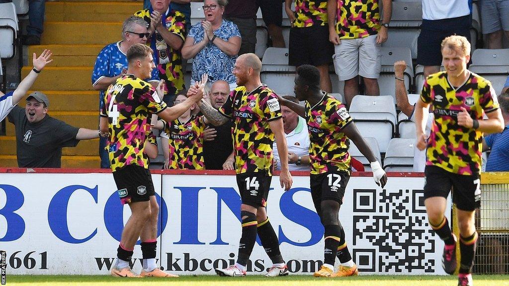 Carlisle celebrate Joe Garner's equaliser