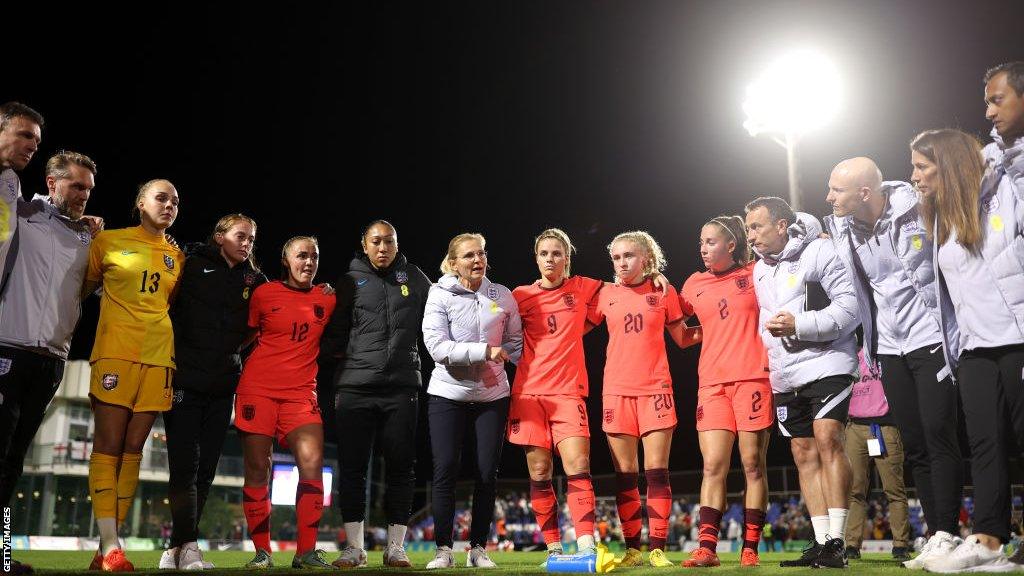 England's Sarina Wiegman talks to her team