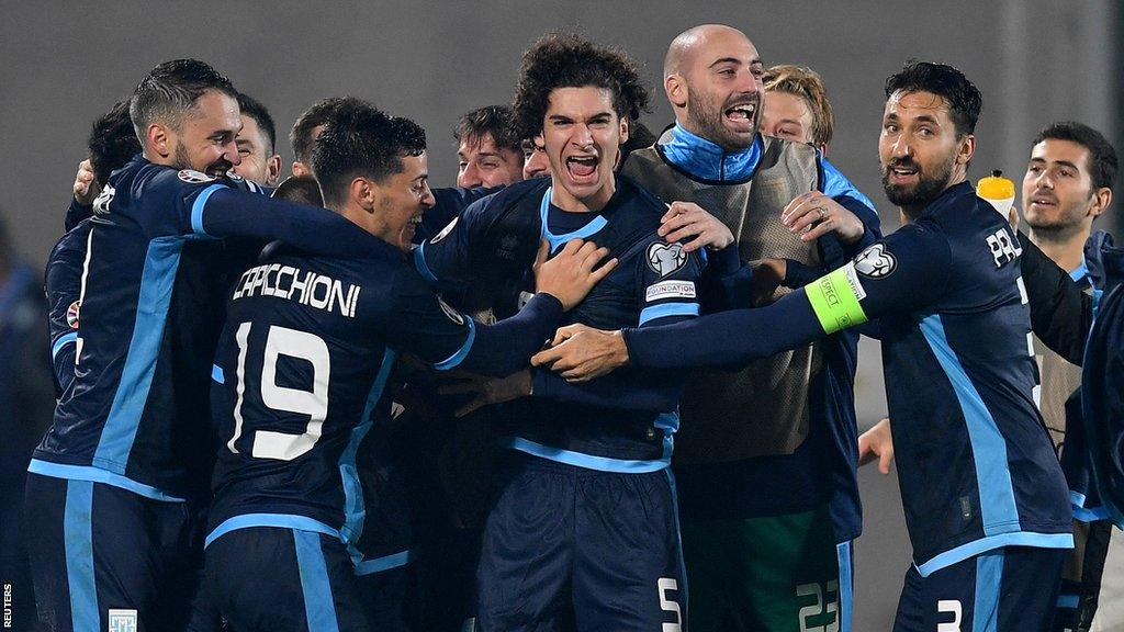 San Marino celebrate scoring a penalty against Finland