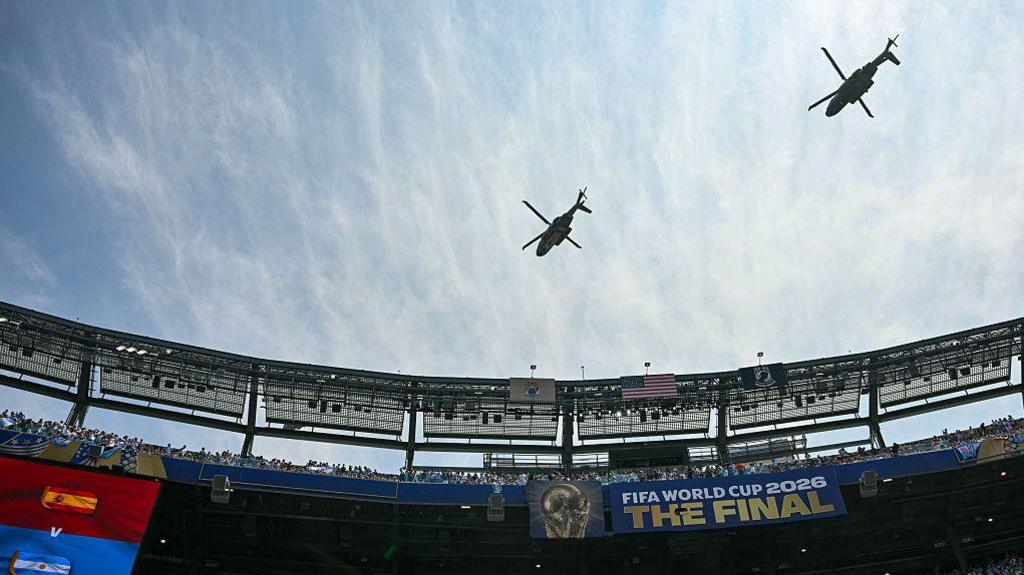 Marine One, carrying US President Donald Trump, flies over the stadium ahead of the 2026 World Cup football tournament final match between Spain and Argentina at the New York/New Jersey Stadium in East Rutherford on July 19, 2026