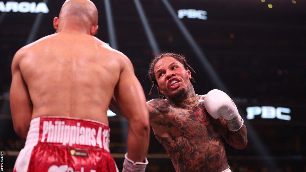 Gervonta Davis throws a right hand against Hector Luis Garcia in January 2023