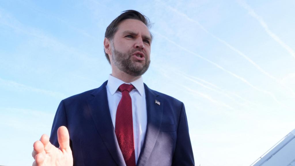 JD Vance speaks to the media before boarding Air Force Two for expected departure to Pakistan for talks on Iran