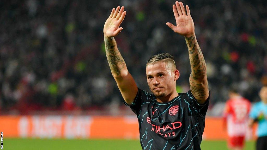 Kalvin Phillips waves to the crowd while playing for Manchester City