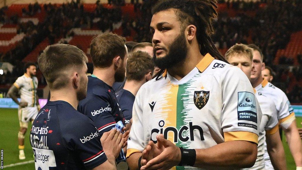 Lewis Ludlam leaves the pitch following Northampton's defeat at Bristol