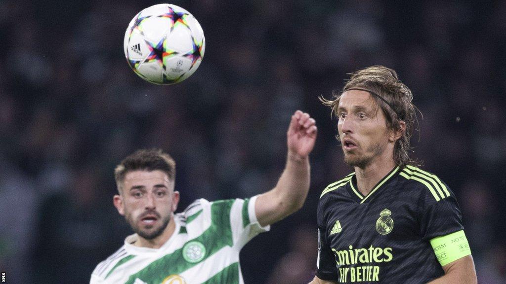 Celtic's Greg Taylor and Real Madrid's Luka Modric