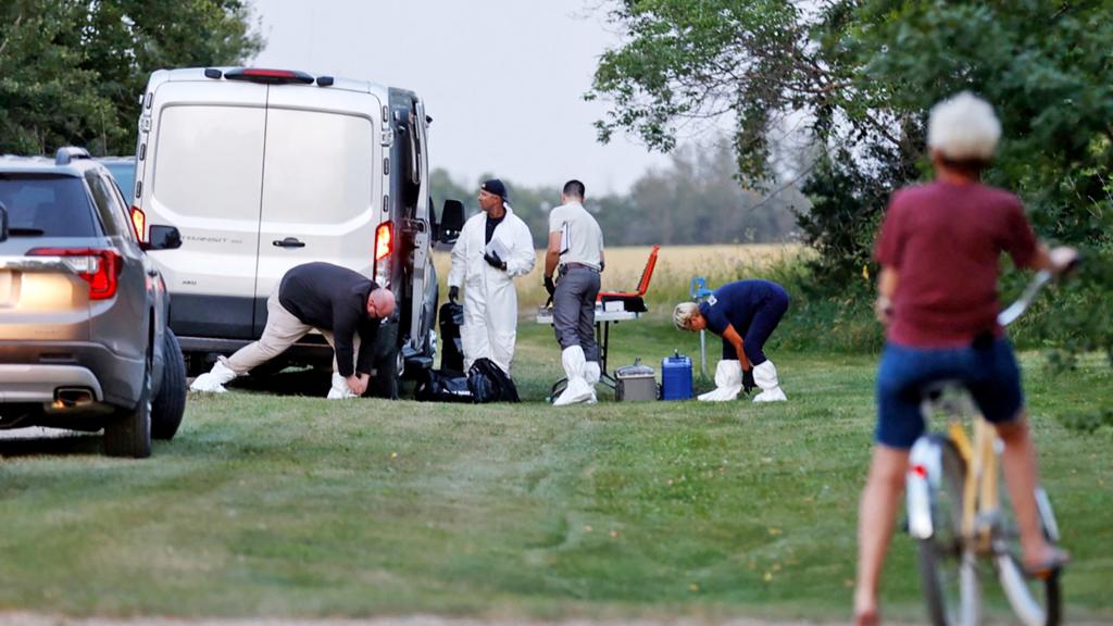 A police forensics team investigates a crime scene after multiple people were killed and injured in a stabbing spree in Weldon, Saskatchewan, Canada, on 4 September 2022