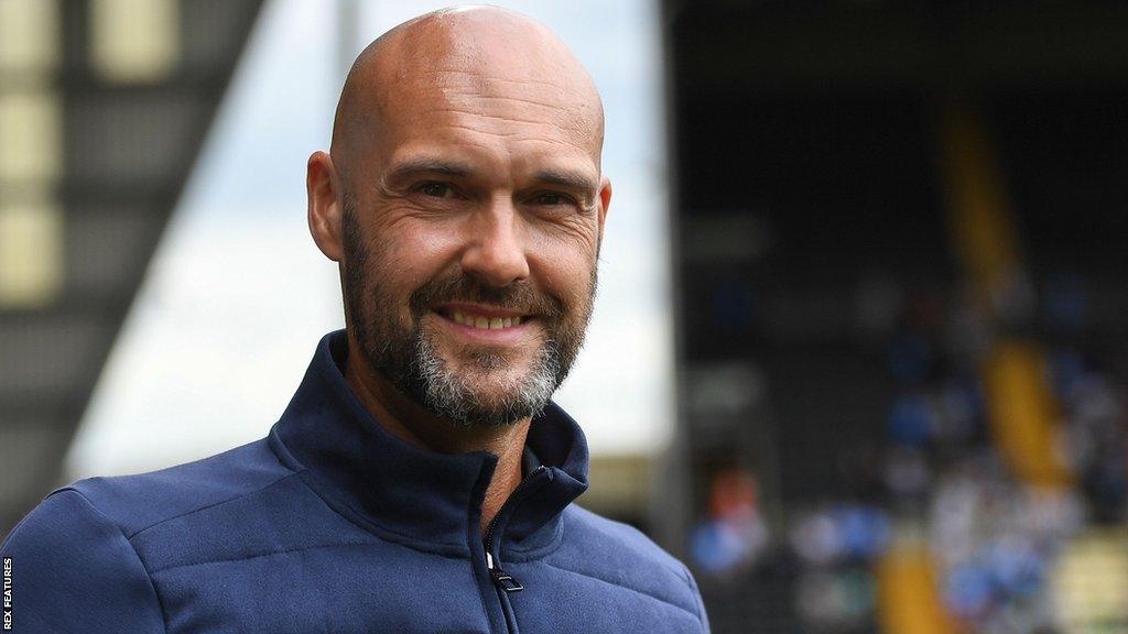 Luke Williams smiles before Notts County's friendly with Stoke City