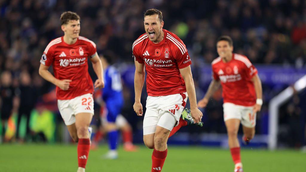 Chris Wood celebrates scoring a goal against Leicester City