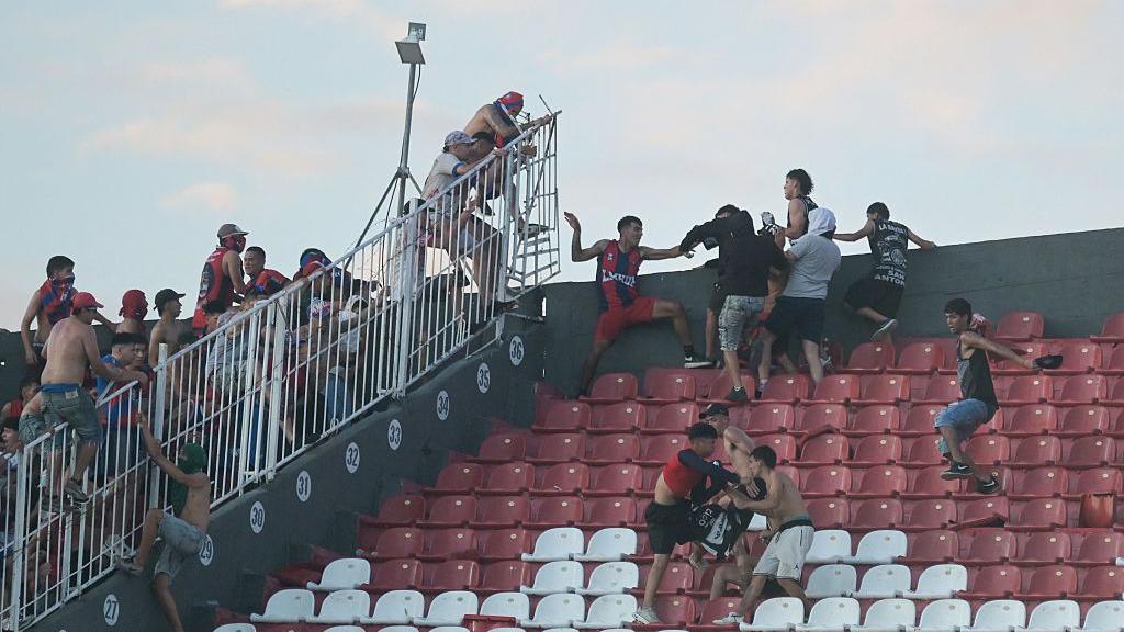 Fans of Cerro Porteno and Olimpia clash