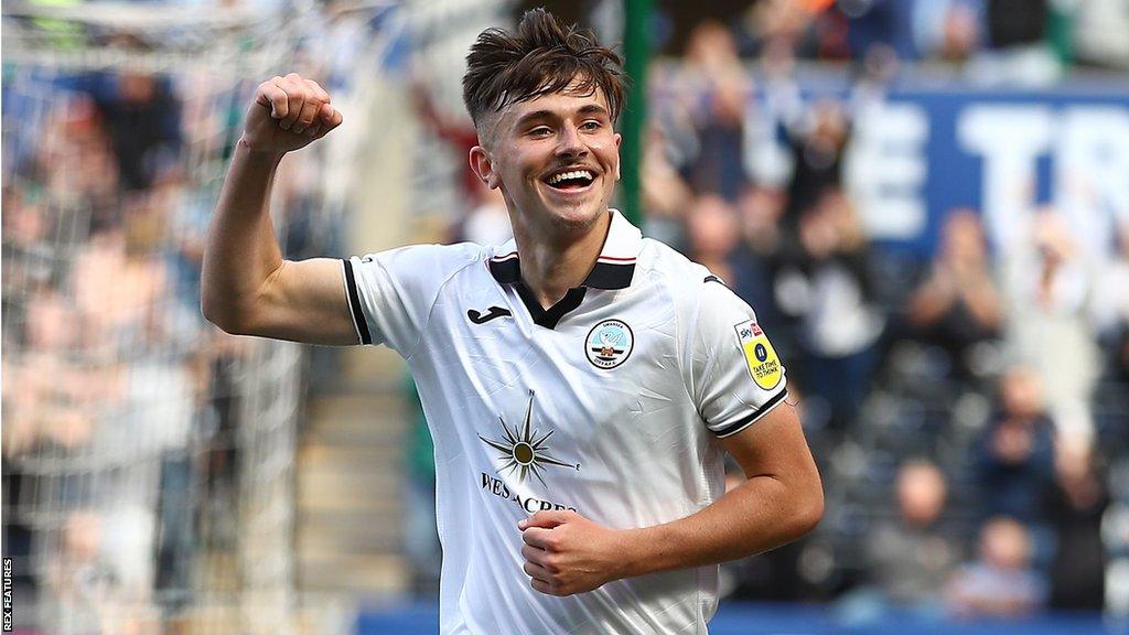 Luke Cundle celebrates scoring for Swansea