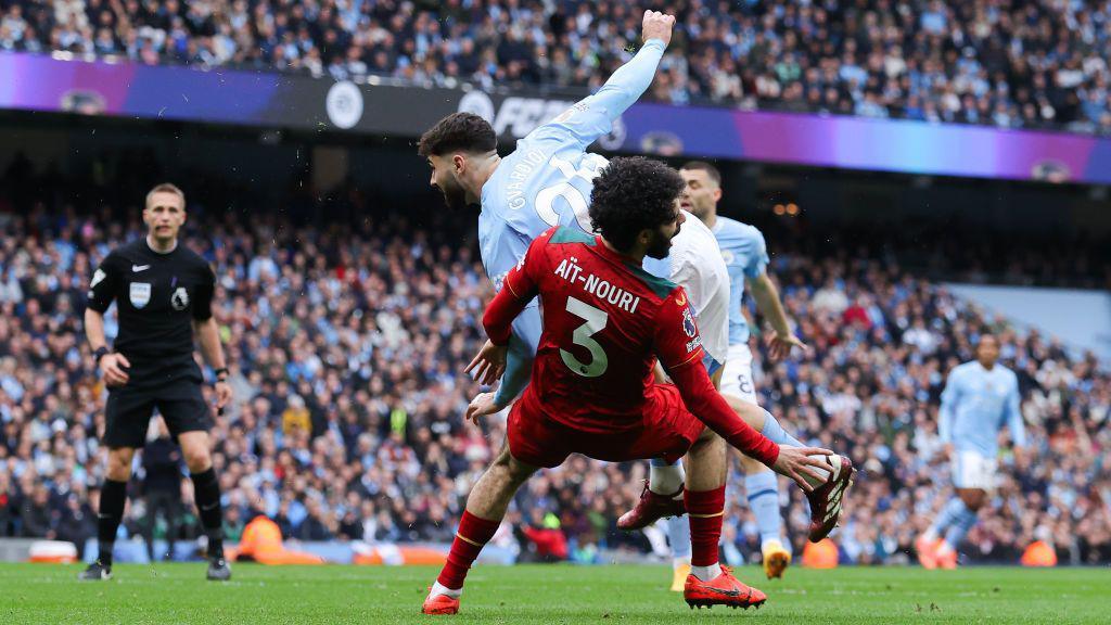 Josko Gvardiol of Manchester City is fouled by Rayan Ait-Nouri of Wolverhampton Wanderers resulting in a penalty kick