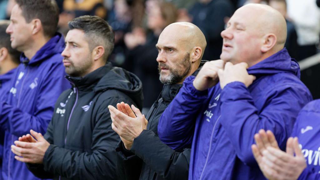 Alan Sheehan and Kristian O'Leary alongside Luke Williams