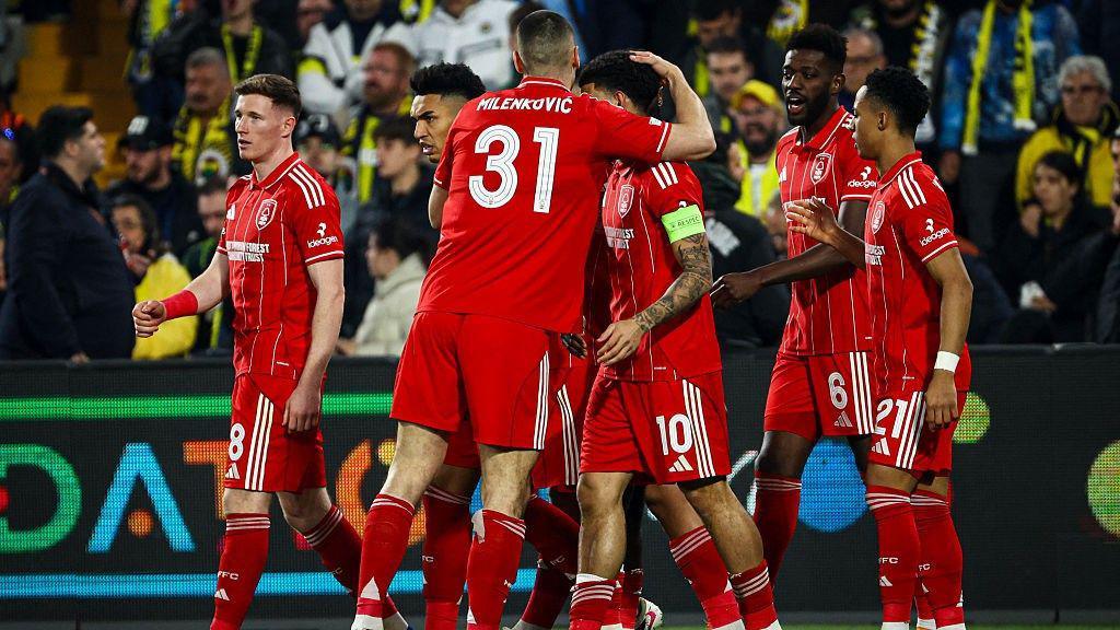 Nottingham Forest's players celebrate after Morgan Gibbs-White's goal