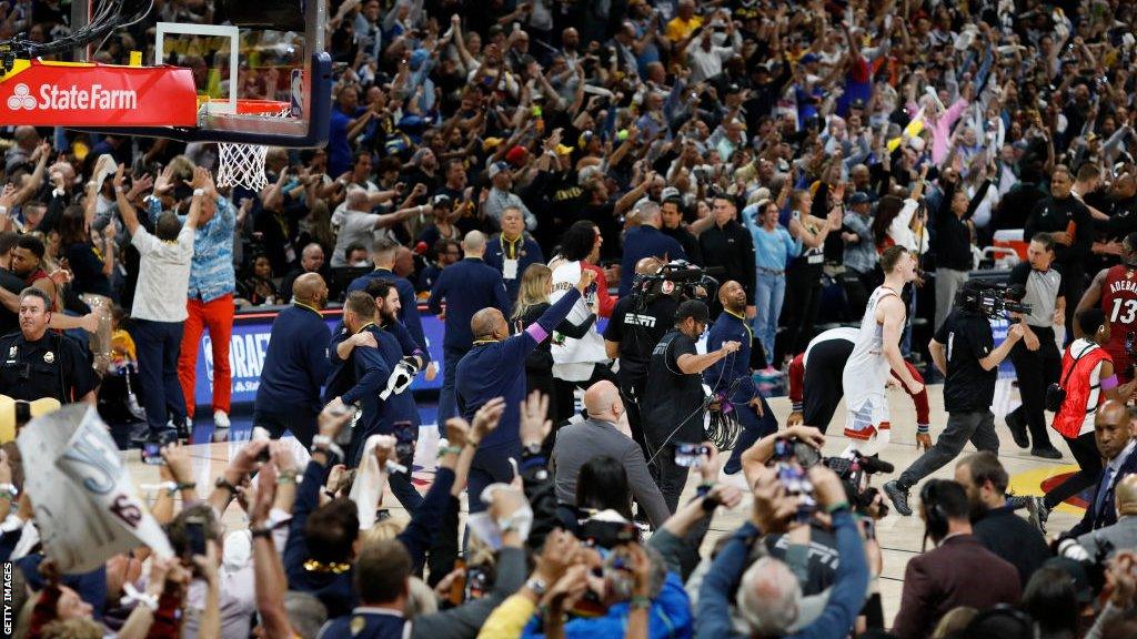 Denver Nuggets celebrate their victory