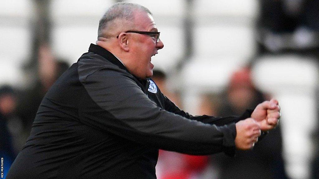 Steve Evans celebrates a Stevenage goal against Derby County