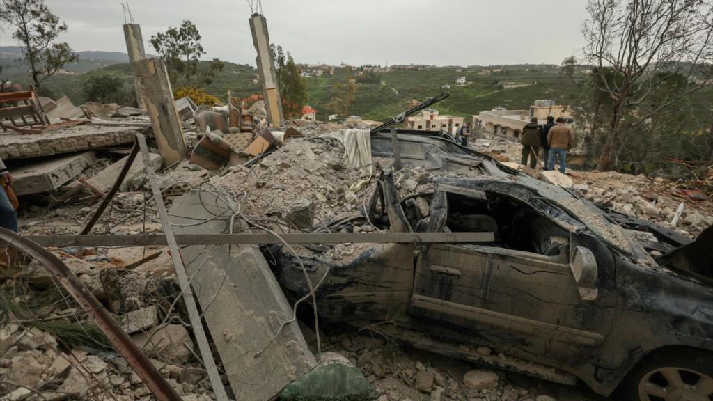 A destroyed car among the rubble of a house hit by an Israeli strike, amid escalating hostilities between Israel and Hezbollah, as the U.S.-Israel conflict with Iran continues, in Houmine El Tahta, Lebanon, April 1, 2026. 