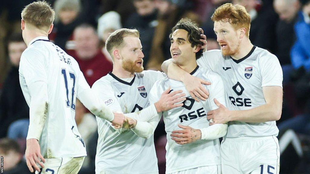 Ross County's Yan Dhanda celebrates with teammates after making it 2-0 during a cinch Premiership match between Heart of Midlothian and Ross County at Tynecastle Park