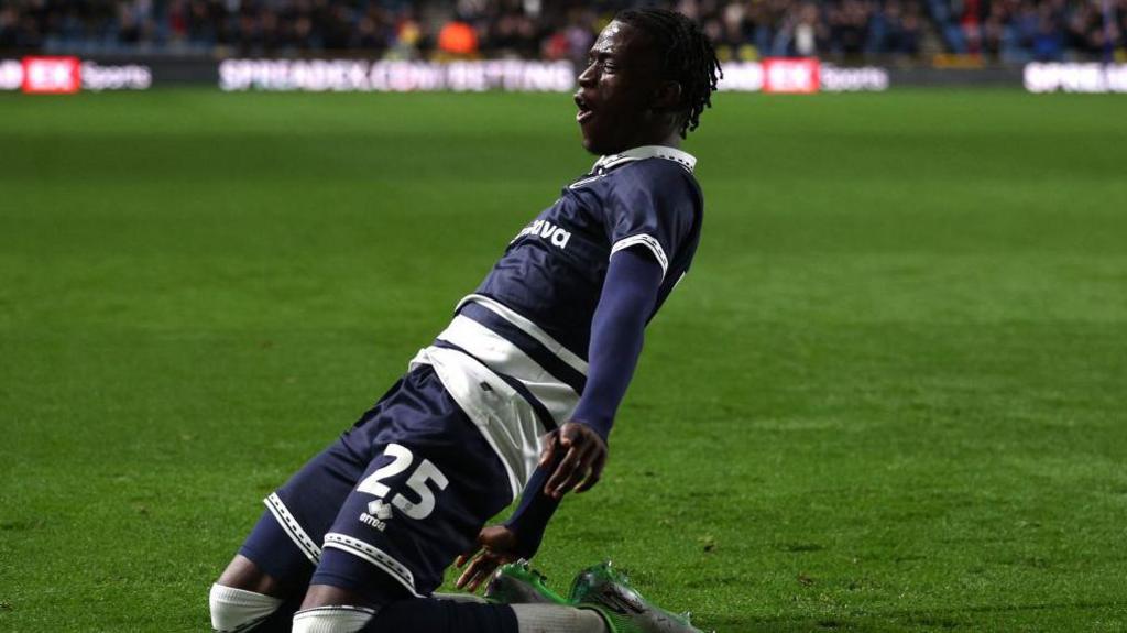 Romain Esse celebrates his goal for Millwall against Plymouth Argyle