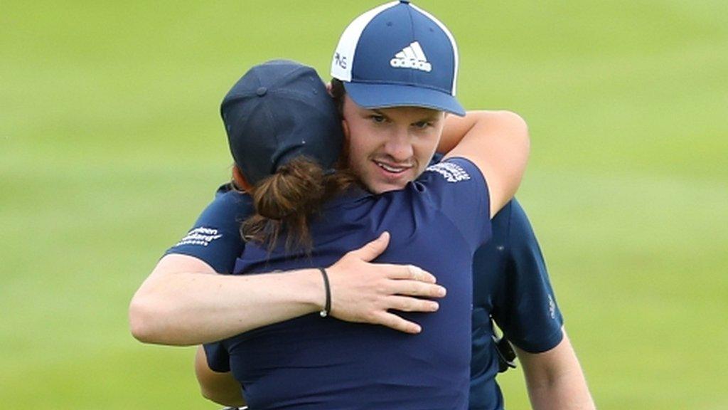 Connor Syme and Michele Thomson of Great Britain celebrate