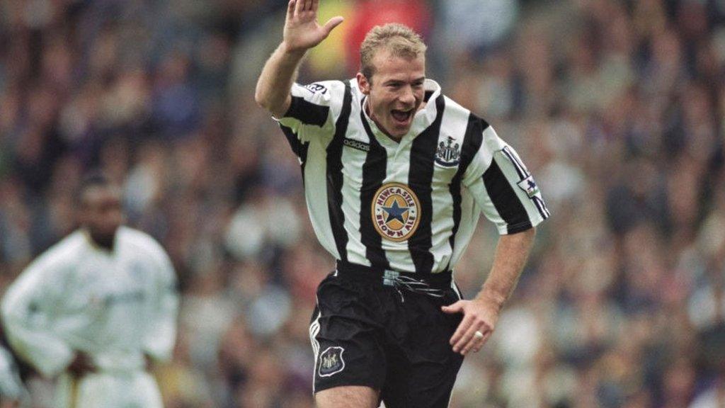 Alan Shearer celebrates in trademark fashion with his arm in the air after scoring for Newcastle