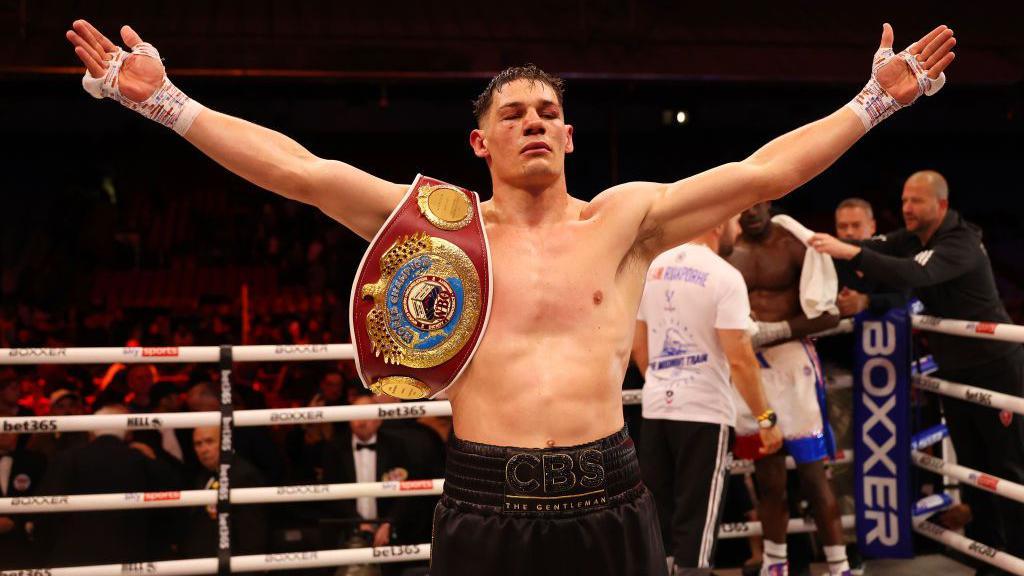 Chris Billam-Smith celebrates with the WBO cruiserweight belt after his title fight against Richard Riakporhe at Selhurst Park