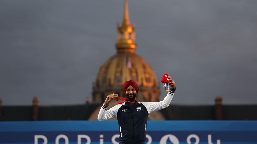 PARIS, FRANCE - SEPTEMBER 04: Harvinder Singh of Team India, gold medalist, poses for pictured after winning the Men's Individual Recurve Open Gold Medal on day seven of the Paris 2024 Summer Paralympic Games at Esplanade Des Invalides on September 04, 2024 in Paris, France. (Photo by Steph Chambers/Getty Images)
