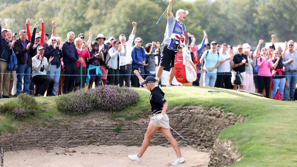 Charley Hull celebrates her bunker shot for eagle on the 11th