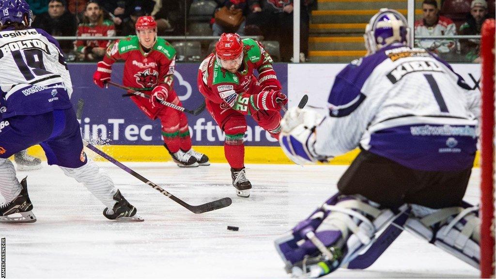 Cardiff Devils' Riley Brandt shoots against Glasgow Clan