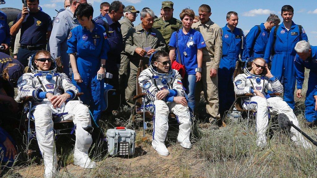 astronauts relax after landing