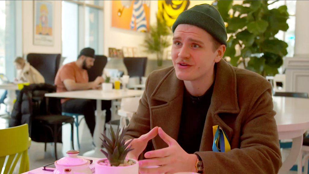 Yevgeny sitting in a cafe