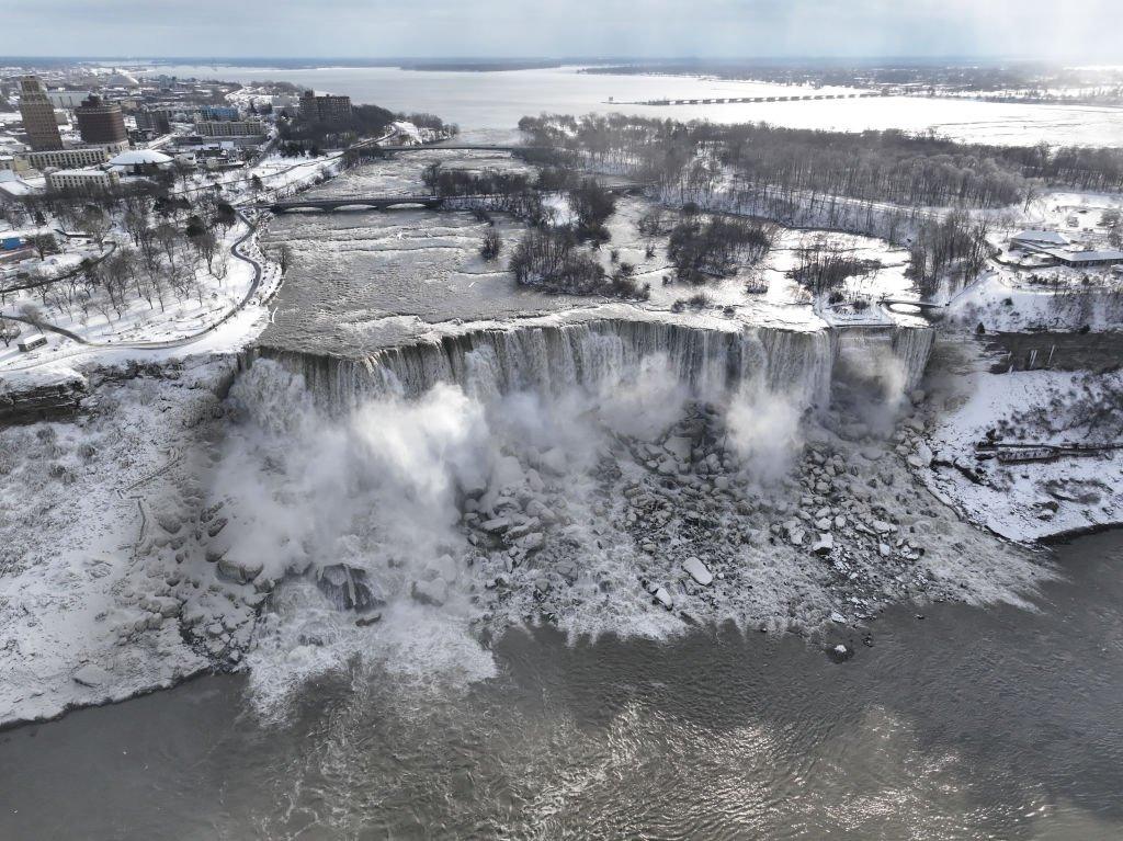 An aerial view of the partially frozen Niagara Falls, which is on the border with Canada