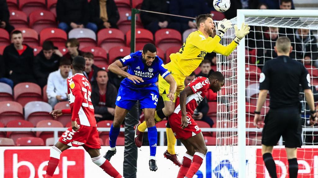 Middlesbrough's Luke Daniels drops the ball under pressure from Cardiff City's Curtis Nelson