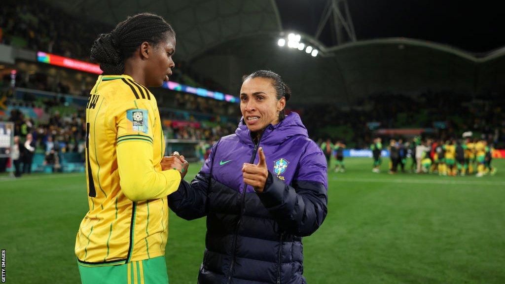 Brazil's Marta and Khadija Shaw of Jamaica share a chat at full-time