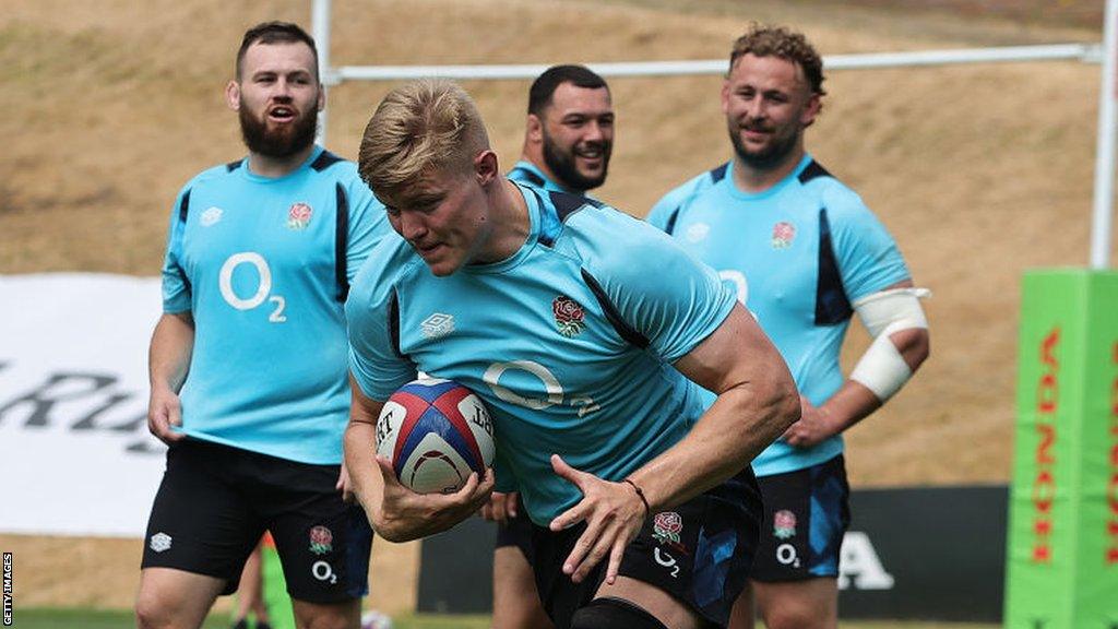 Tom Pearson carries the ball