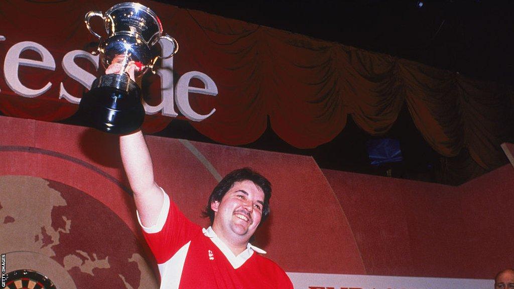 Phil Taylor lifts the BDO World Darts Championship in 1990